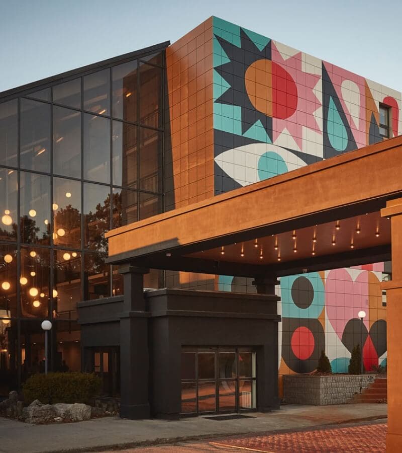 Exterior mural by Gillian Wilson, dusk