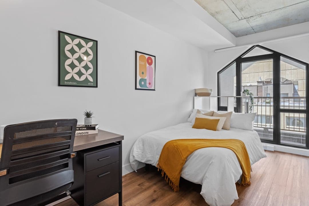 Furnished bedroom at ALMA Shaughnessy Village