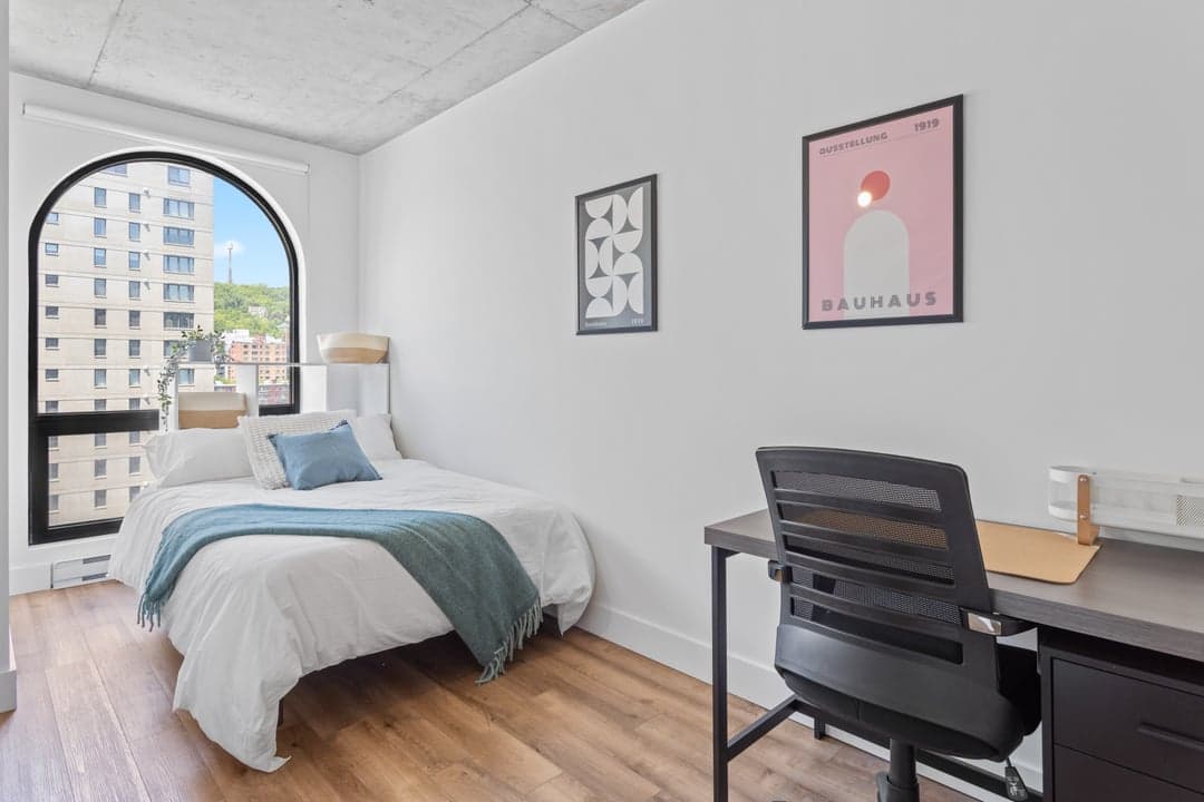 Furnished bedroom at ALMA Shaughnessy Village