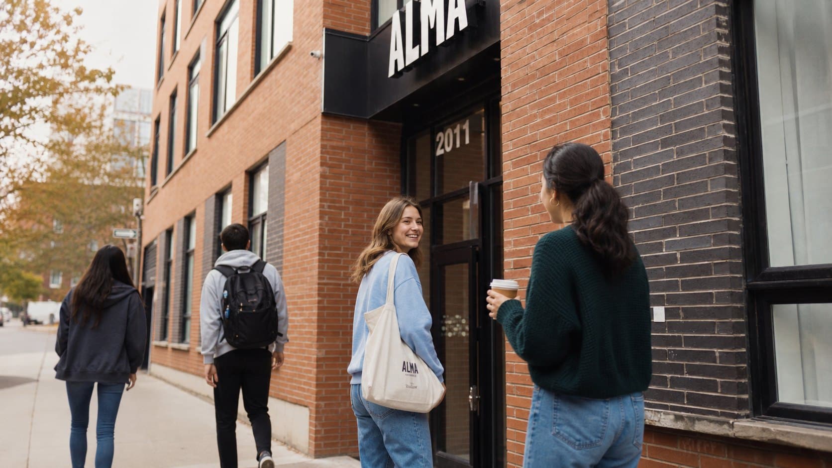 Residents outside ALMA Quartier Latin on avenue Joly