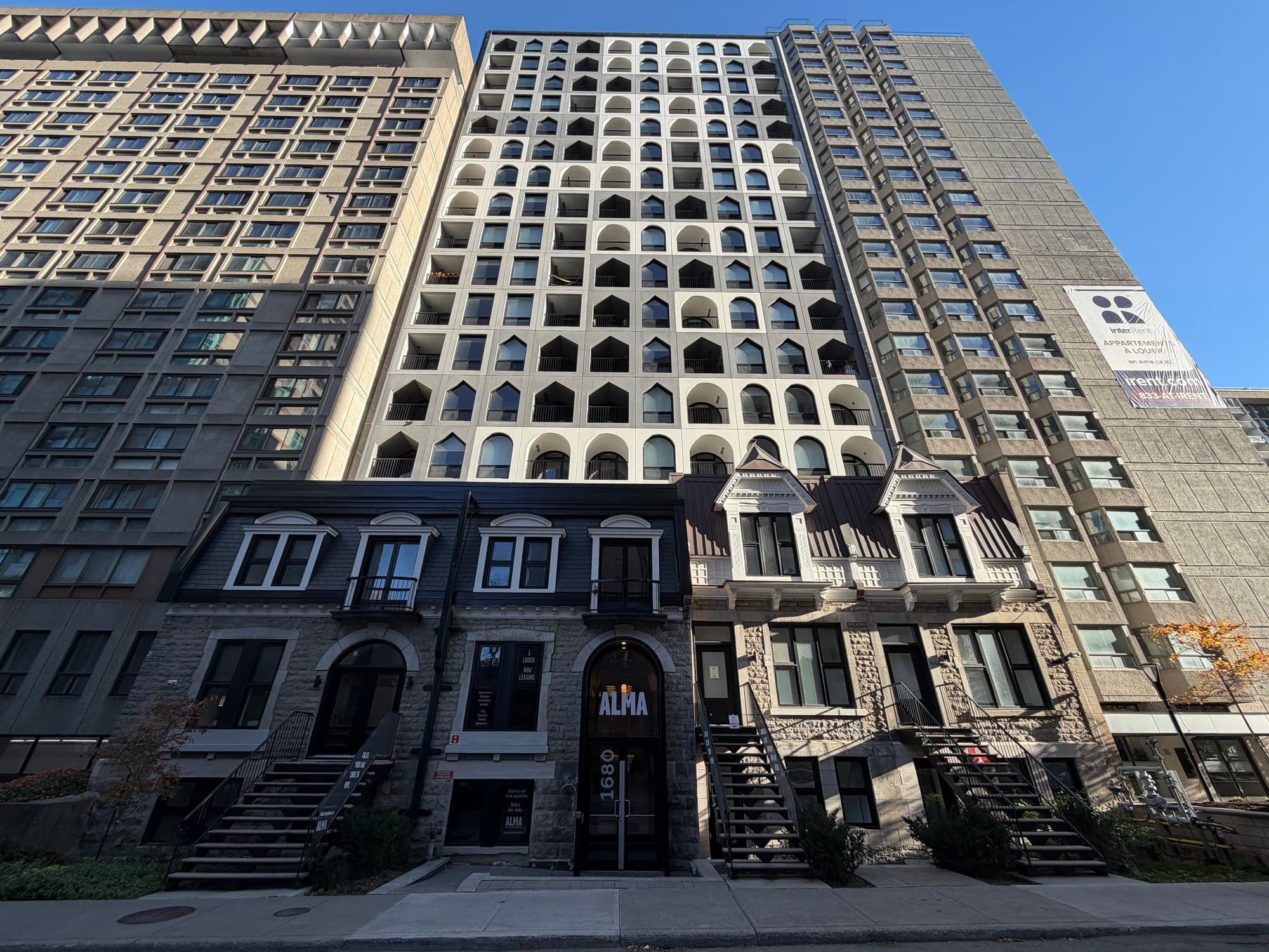ALMA Shaughnessy Village on Lincoln Avenue, the tower above the greystone rowhouses