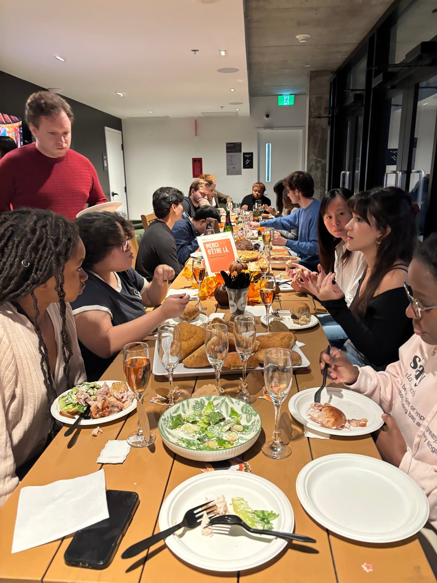 Friendsgiving dinner with residents in the lounge at ALMA Shaughnessy Village