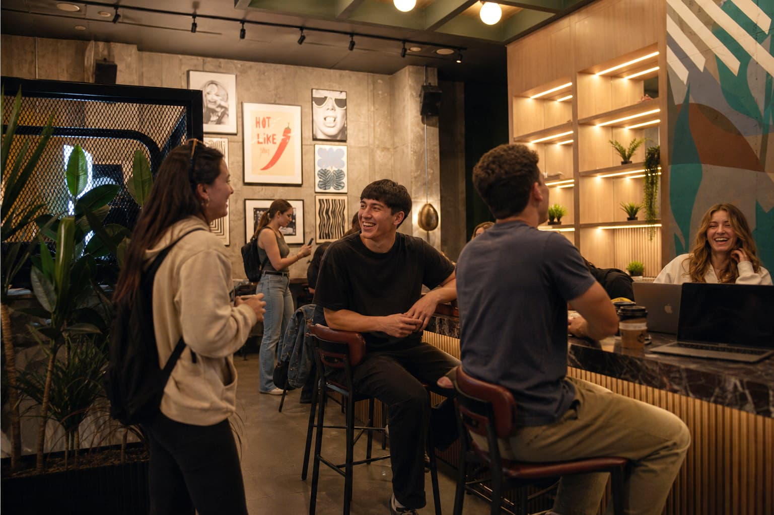 Residents at the bar at The Collective